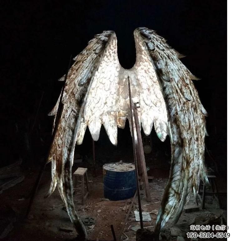城市翅膀雕塑，網(wǎng)格燈光雕塑，古銅效果