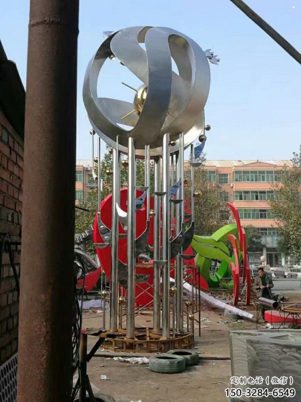地球儀雕塑定制，小區(qū)雕塑，不銹鋼手托地球儀雕塑廠家