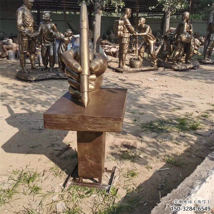 手握鋼筆雕塑承接，城市雕塑，仿銅手握鋼筆雕塑廠(chǎng)家