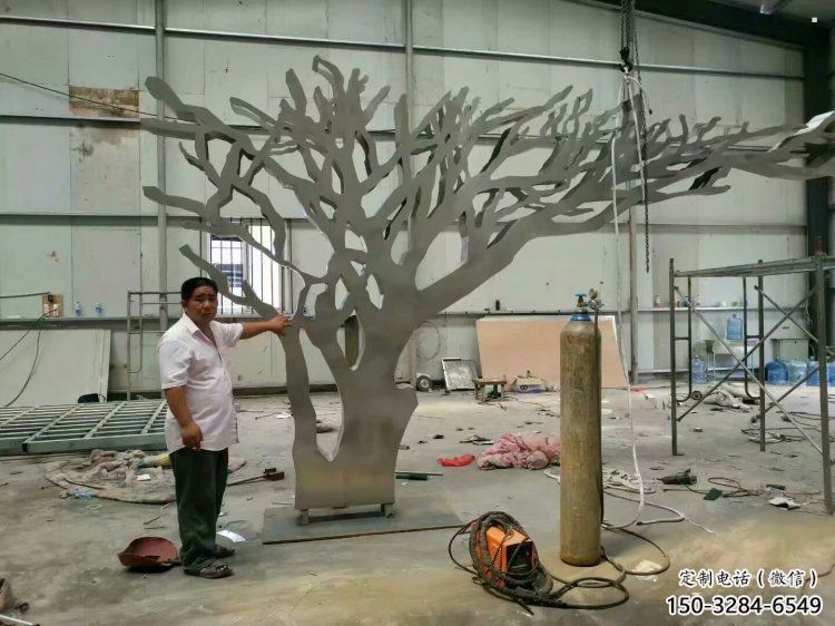 抽象鏤空樹(shù)雕塑，小區(qū)雕塑，鏤空剪紙樹(shù)雕塑廠家