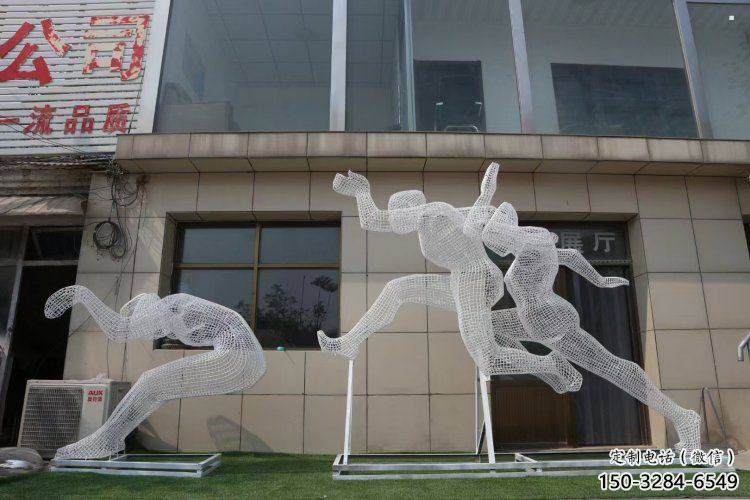 鏤空體育雕塑常用，公園小品，鐵藝運(yùn)動(dòng)人物雕塑生產(chǎn)商