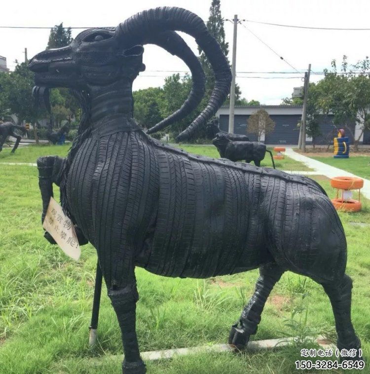 澄邁輪胎山羊雕塑供應(yīng)，公園雕塑，鑄銅輪胎羊雕塑供求